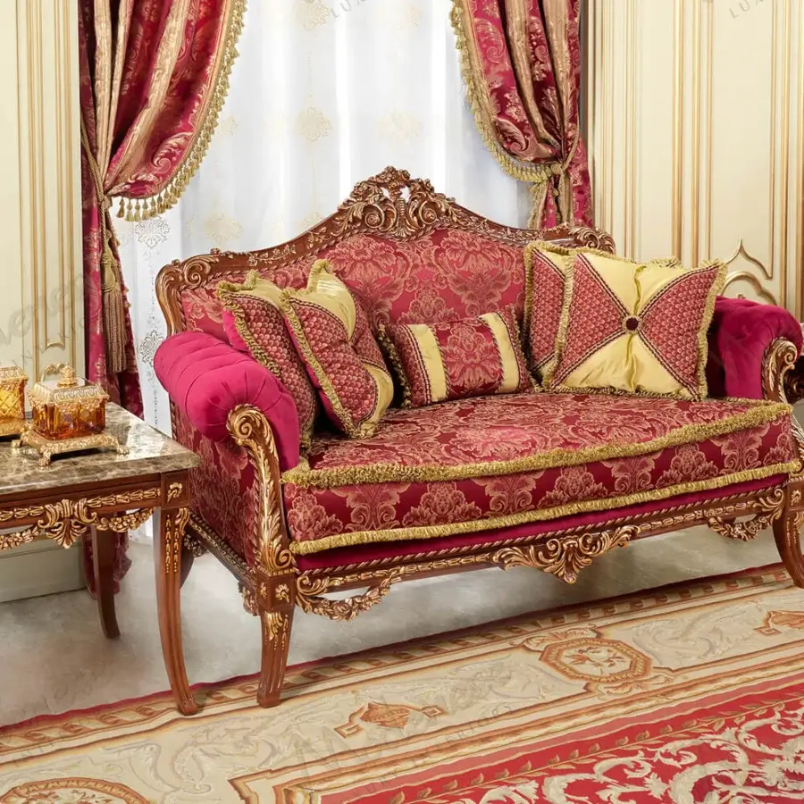 Distinguished Modenese Rubino Delight sofa upholstered in ruby-red damask with gold embroidery and a walnut gold leaf finish