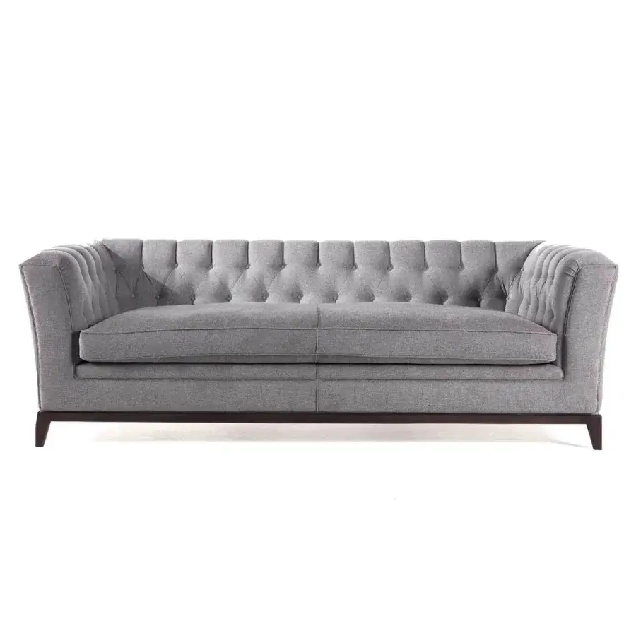 Distinguished Zanaboni Stark sofa upholstered in medium gray textile with a capitonné backrest and dark-toned wood base
