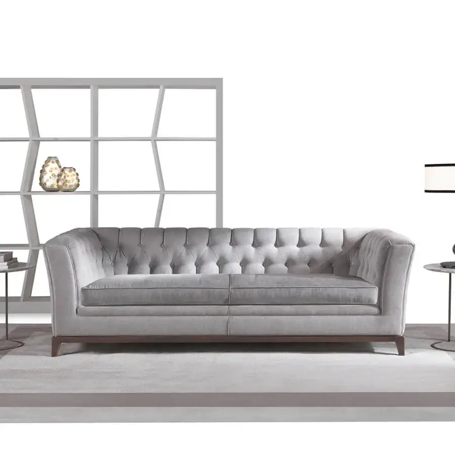 Refined Zanaboni Stark sofa in muted gray woven fabric with a capitonné backrest and gently curved arms