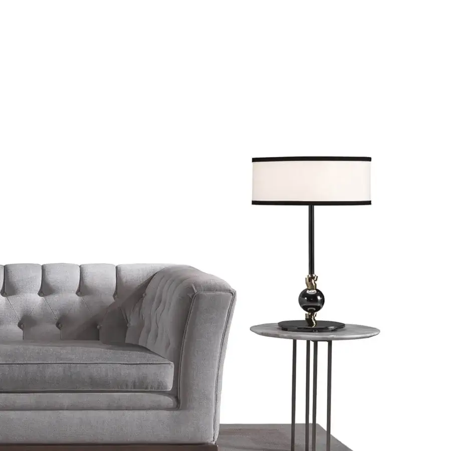 Distinguished Zanaboni Stark sofa crafted in neutral gray textile with capitonné detailing and a dark-toned base for balanced aesthetics