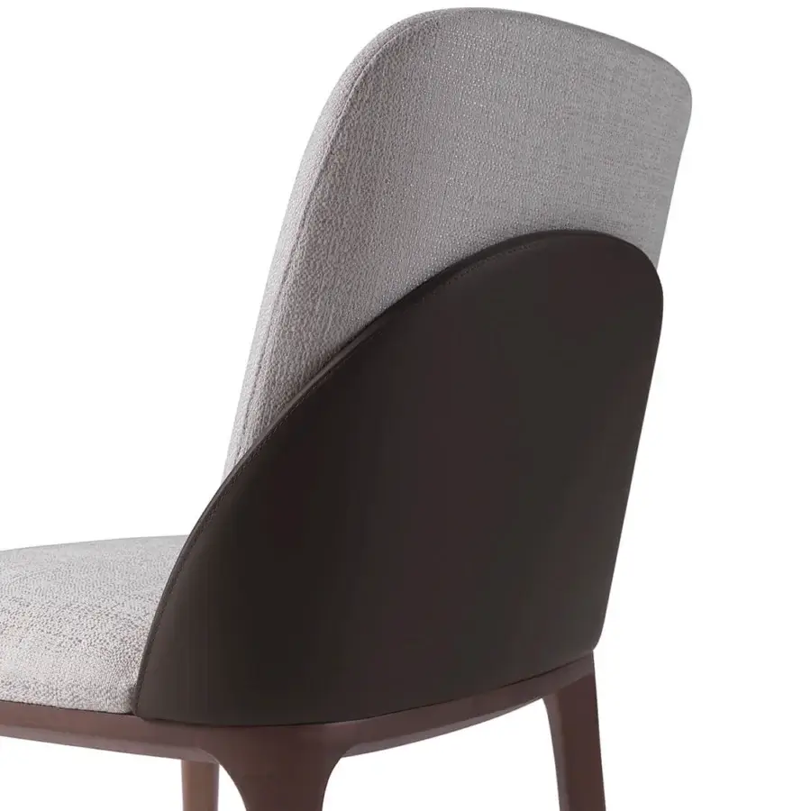 Superior Zanaboni Tweet chair with inviting upholstered seat, smoke-stained ash wood legs and dark brown back detail
