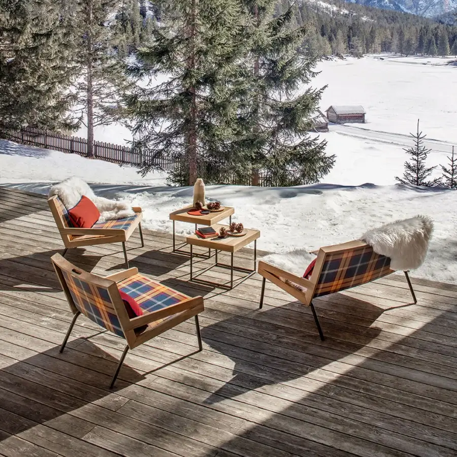 Distinguished Ethimo Allaperto lounge chair with satin-finish wood and multi-toned plaid upholstery in blue, brown, and cream