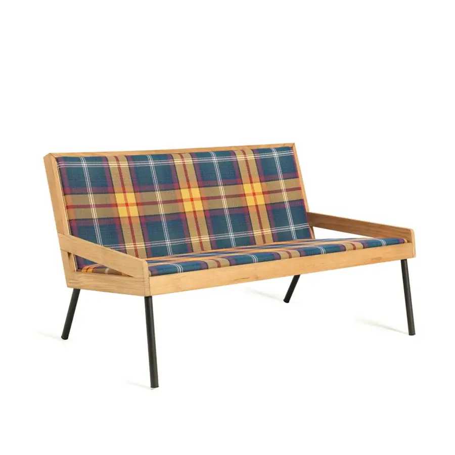 Architectural Ethimo Allaperto two-seater sofa with light wood frame, black metal legs and vibrant yellow, blue, red plaid textile upholstery