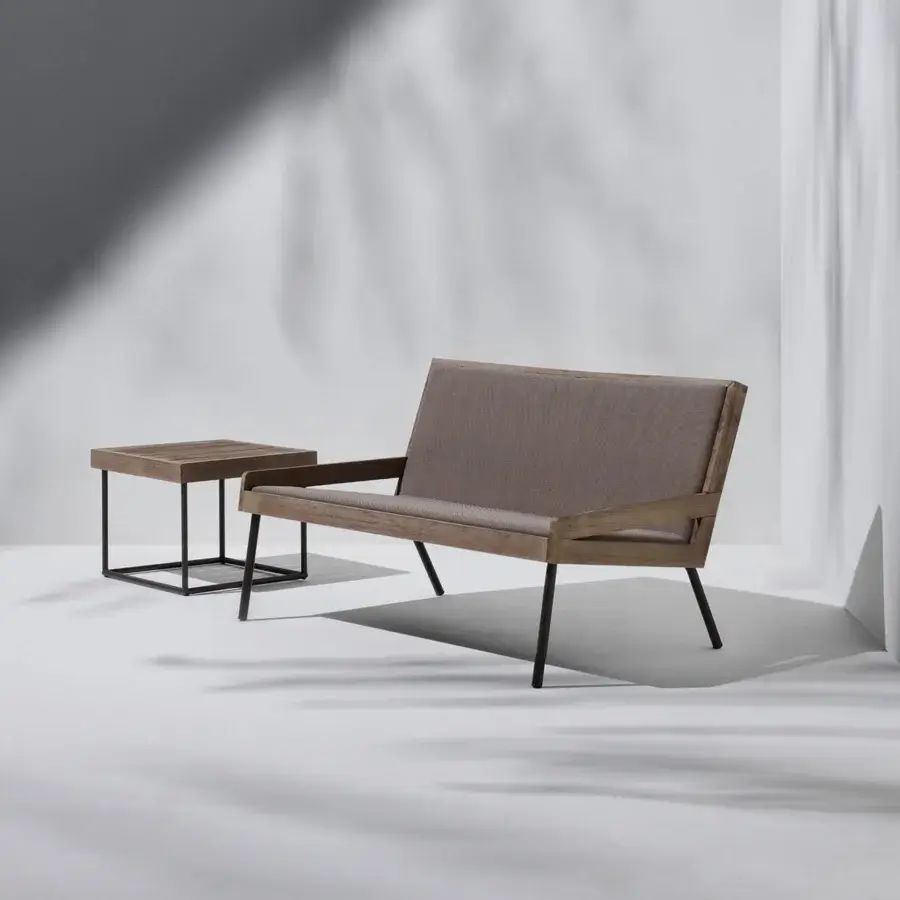 Captivating Ethimo Allaperto two-seater sofa with textured gray-brown wood and smooth neutral textile cushions crafted with slender metal legs