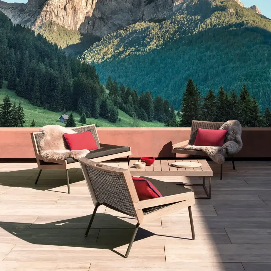 Architectural Ethimo Allaperto two-seater sofa with neutral woven textile, red cushion and satin-finish wood frame crafted in Italy