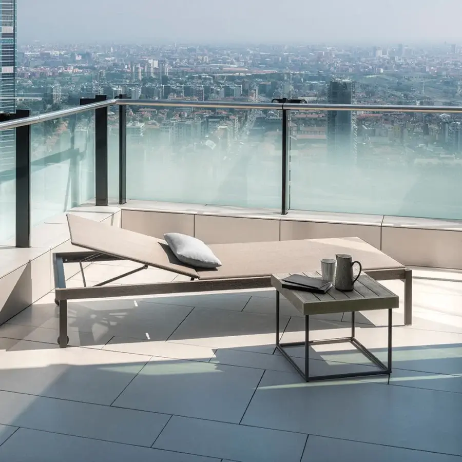 Exceptional Ethimo Allaperto coffee table crafted in warm medium-brown wood with a sleek dark gray metal frame and matte finish