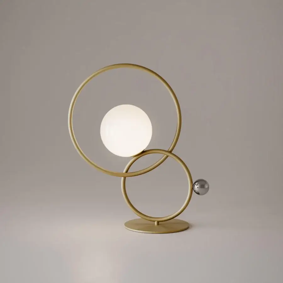 Exceptional VENICEM Zoe table lamp with intersecting burnished brass rings and Murano blown glass diffuser