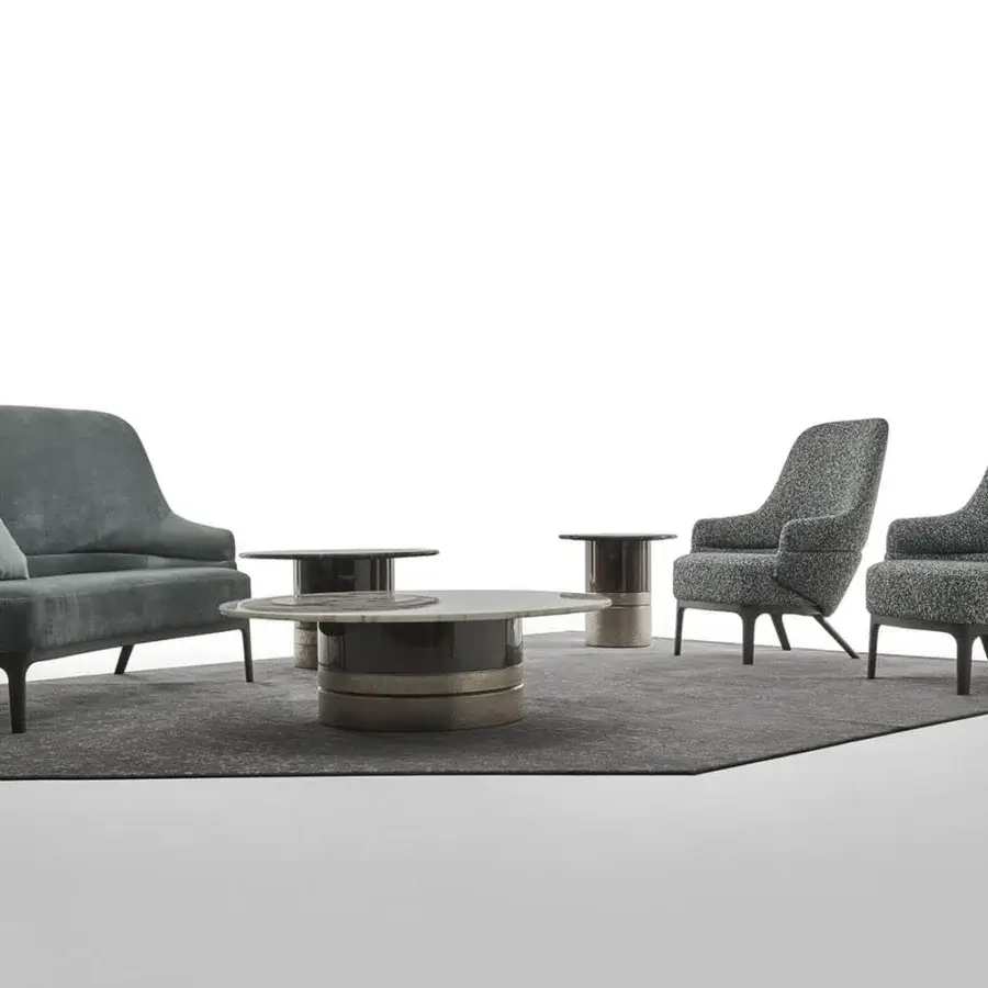 Distinguished Zanaboni Kore sofa handcrafted in Italy with gentle curves and textured teal textile upholstery