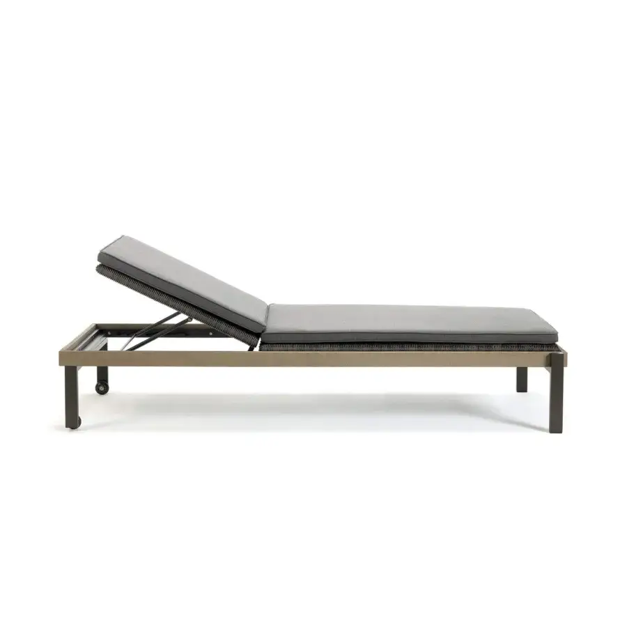 Distinguished Ethimo Allaperto lounger with light-toned wood, gray textured textile and dark metal accents in a satin finish