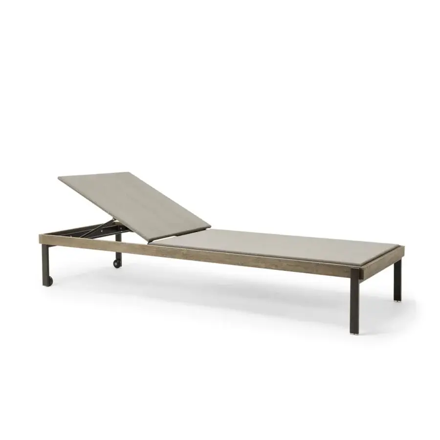 Exceptional Ethimo Allaperto lounger built with wood and textile upholstery in neutral beige with a sleek dark gray metal base