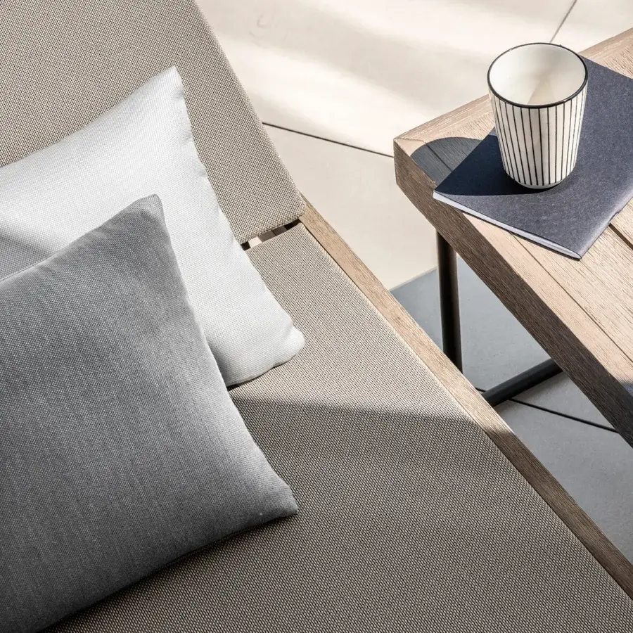 Distinguished Ethimo Allaperto lounger crafted in Italy with textured wood and neutral beige woven upholstery