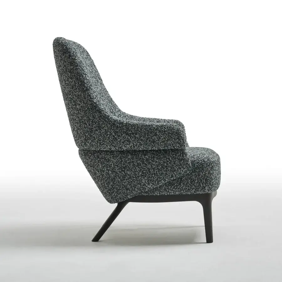 Distinguished Zanaboni Kore lounge chair with speckled dark gray and white textile upholstery and solid wooden tapered legs