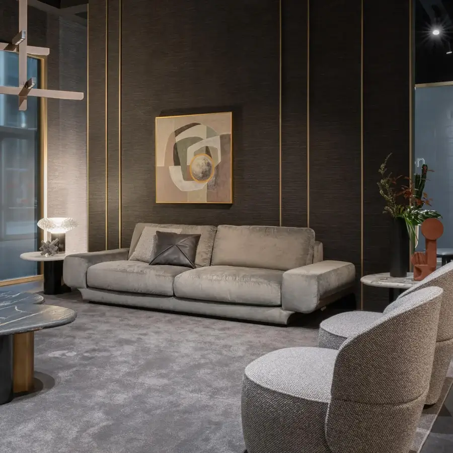 Distinguished Zanaboni Milo sofa with muted gray textile and dark leather insert cushion, exhibiting a smooth matte finish