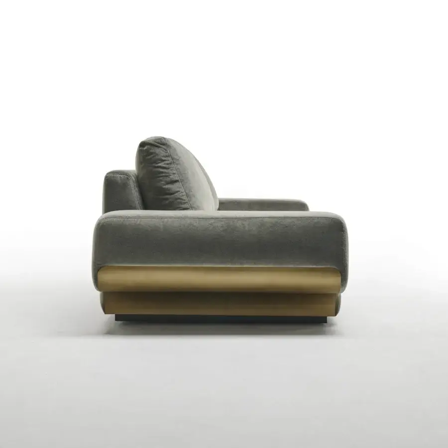 Superior Zanaboni Milo sofa with grayish-green textile upholstery and satin-finish wood wrapping