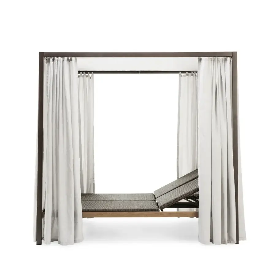 Exceptional Ethimo Allaperto daybed with dark gray matte metal and teak, woven surfaces include flowing off-white sheer curtains