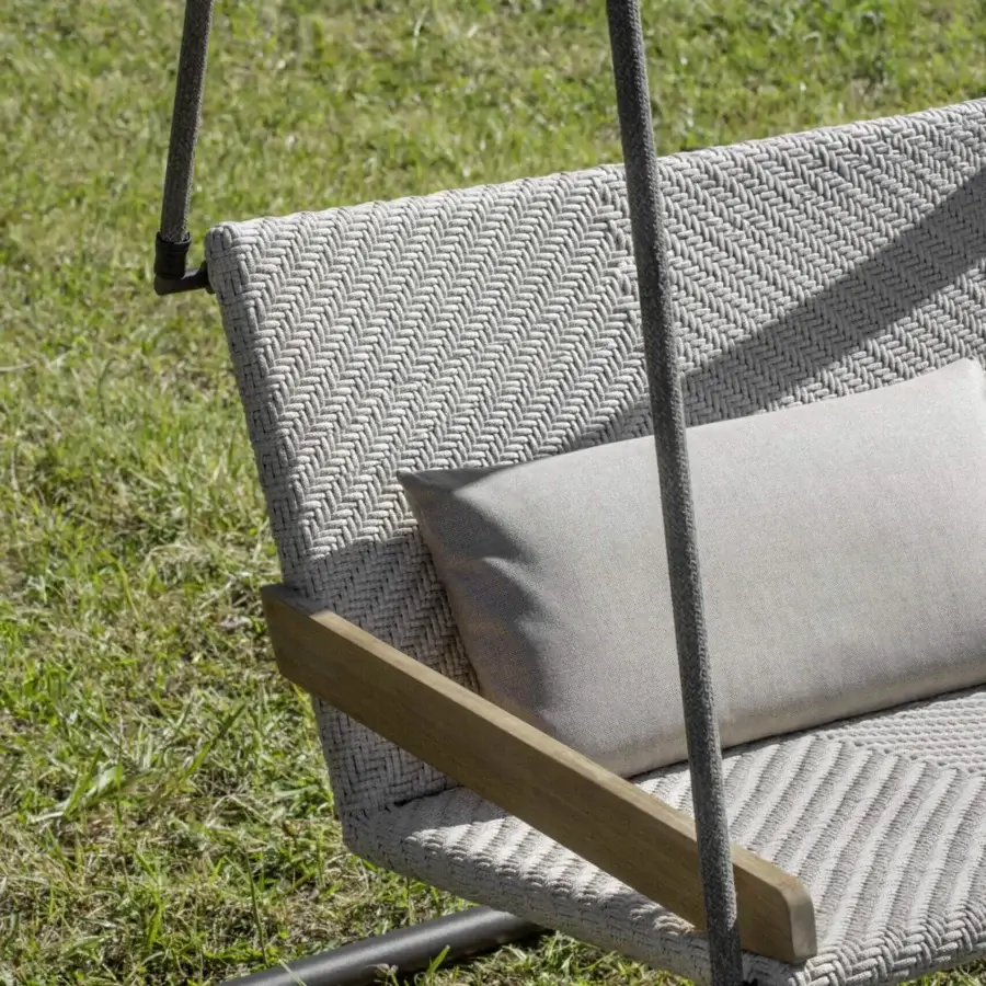Elegant Ethimo Allaperto free-standing double swing with light grey woven textile and warm natural wood armrests built with a dark metal frame