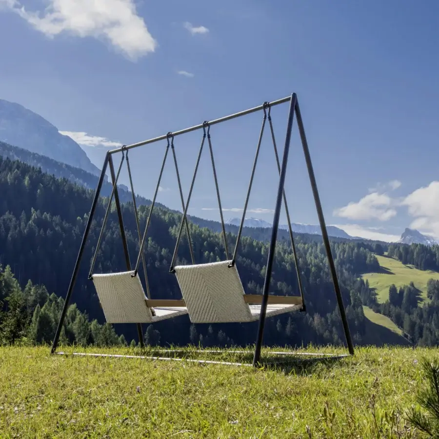 Distinguished Ethimo Allaperto free-standing double swing with dark gray metal, light beige textile and warm natural wood support