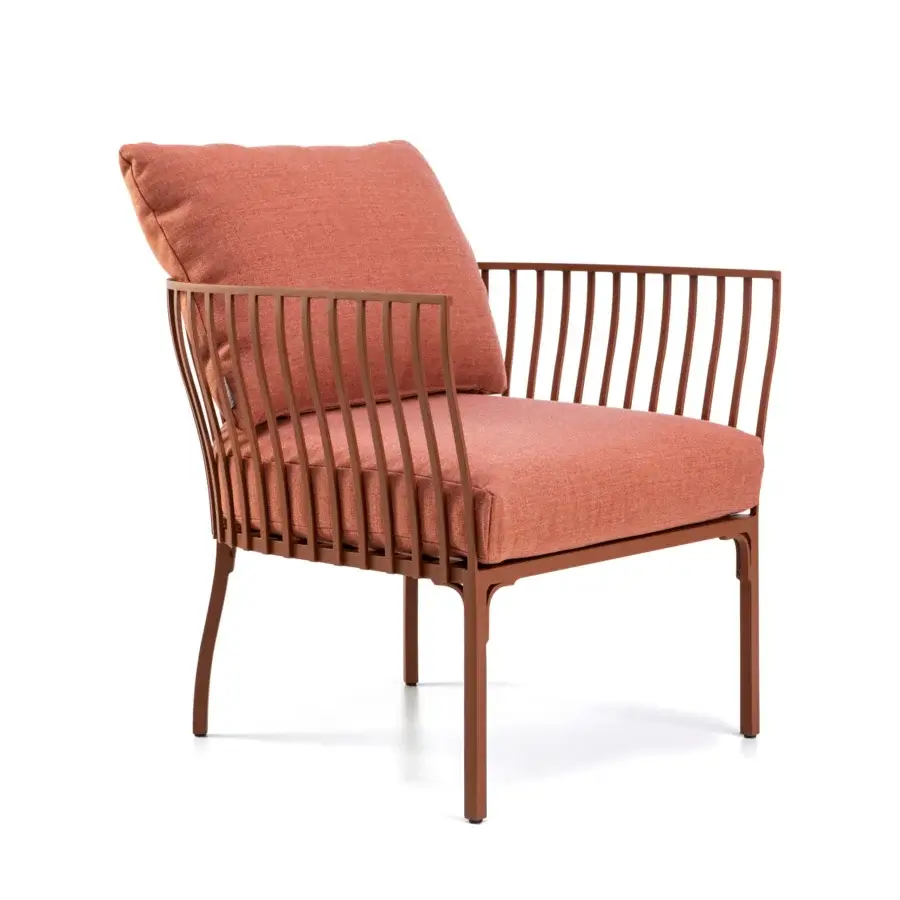 Refined Ethimo Venexia lounge chair in terracotta and aluminum slats with subtly textured textile cushioning