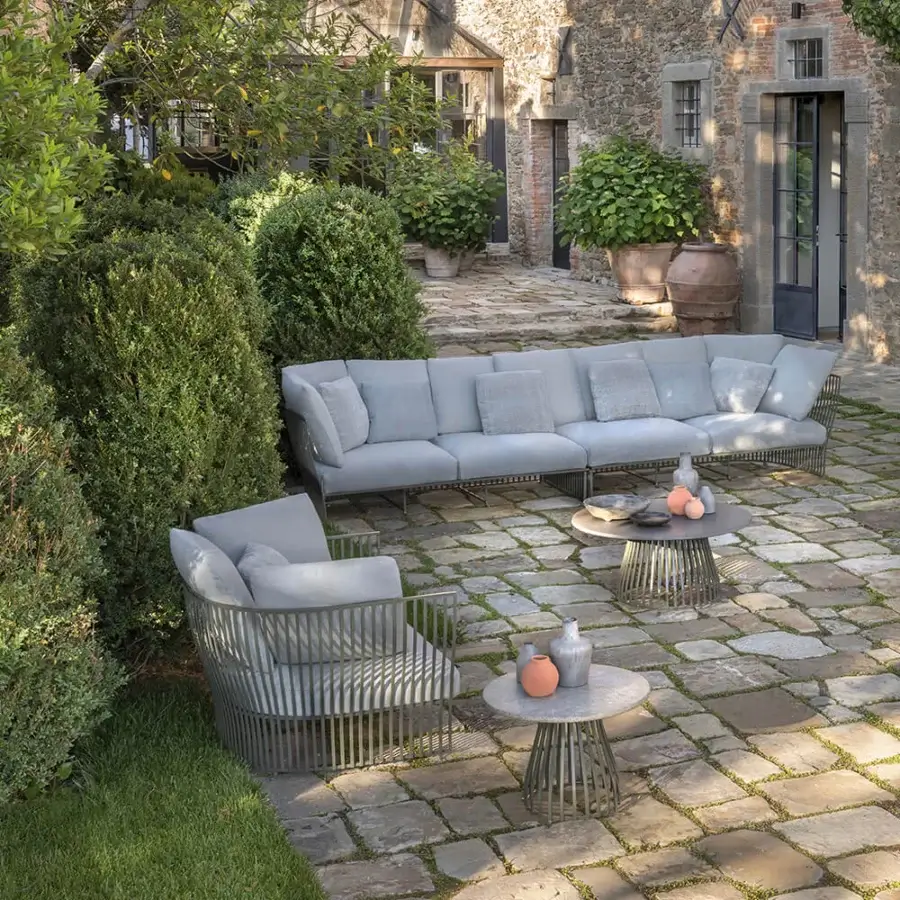 Exceptional Ethimo Venexia lounge chair with slender aluminum slats and plush light gray cushions