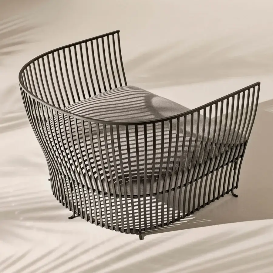 Exceptional Ethimo Venexia lounge chair with enveloping aluminum slats and comfortable light gray textured cushion in matte dark gray finish