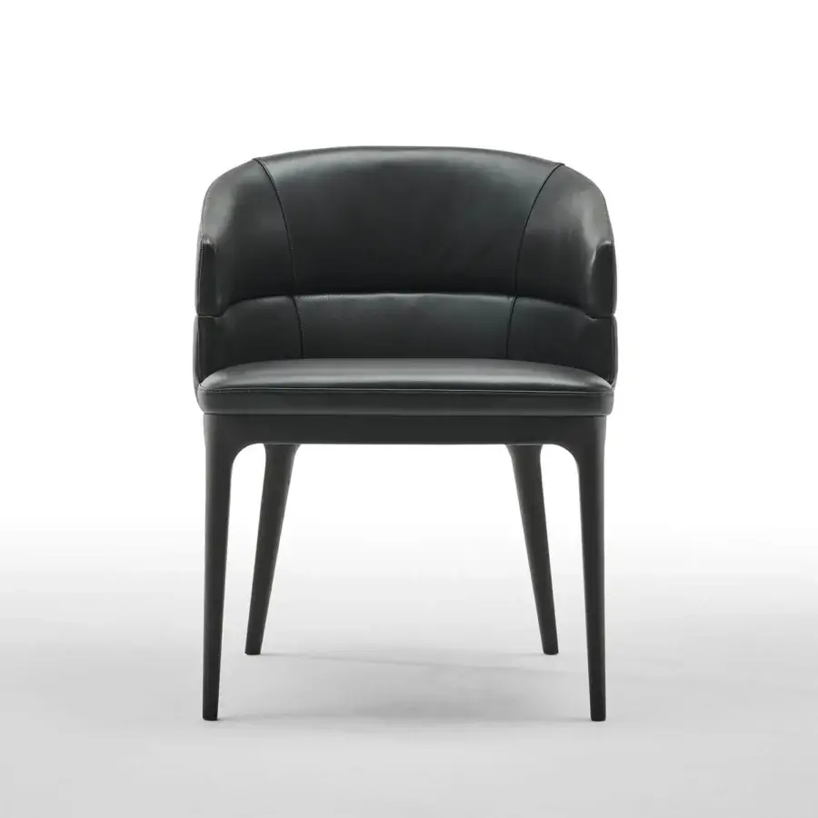 Distinguished Zanaboni Alma armchair crafted in dark leather with an elegant ash wood base and seamless form