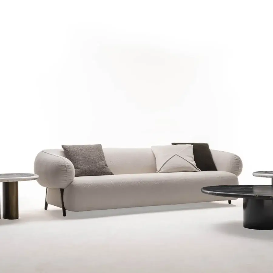 Superior Zanaboni Carol sofa with low rounded silhouette upholstered in textured light beige textile and matte finish