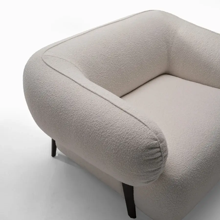 Exceptional Zanaboni Carol lounge chair crafted with wood and fully upholstered in textured neutral beige textile