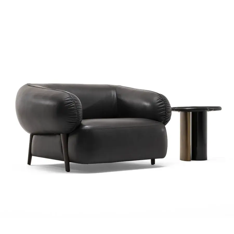 Superior Zanaboni Carol lounge chair with dark-toned leather upholstery and a sturdy wood base built with organic form