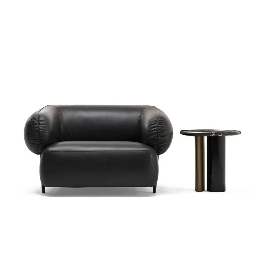 Innovative Zanaboni Carol lounge chair with glossy black leather and wood structure offering a cocoon-like seat with a roller backrest
