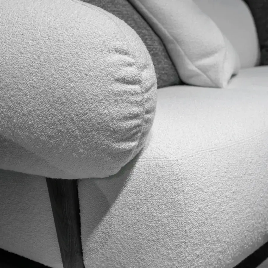 Innovative Zanaboni Carol lounge chair built with textured neutral textile and a pale gray padded form