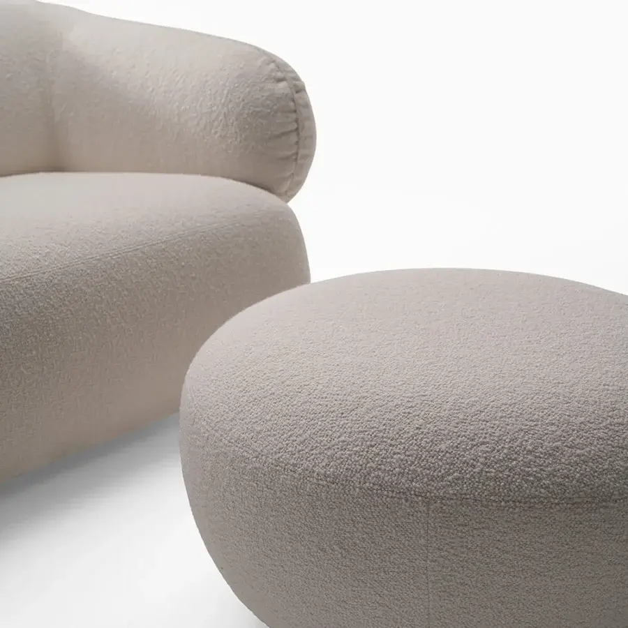 Distinctive Zanaboni Carol ottoman crafted in Italy with textured neutral beige upholstery and matte finish