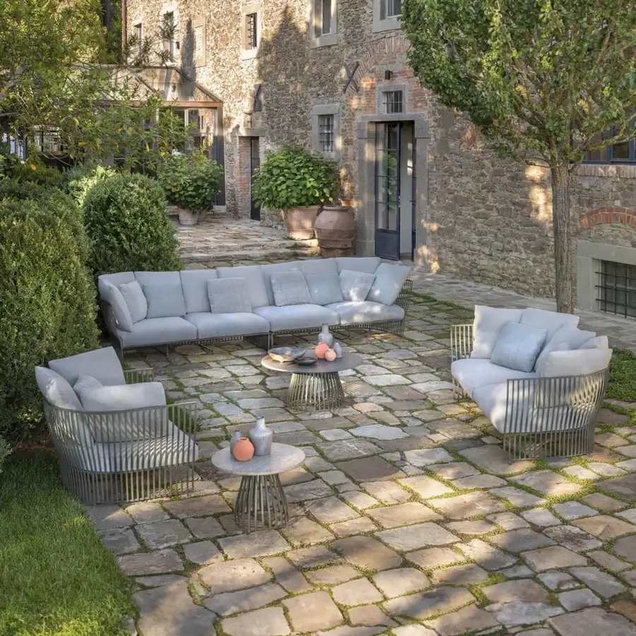 Distinguished Ethimo Venexia sofa with thin aluminum slats and high-performance cushions in a muted gray tone