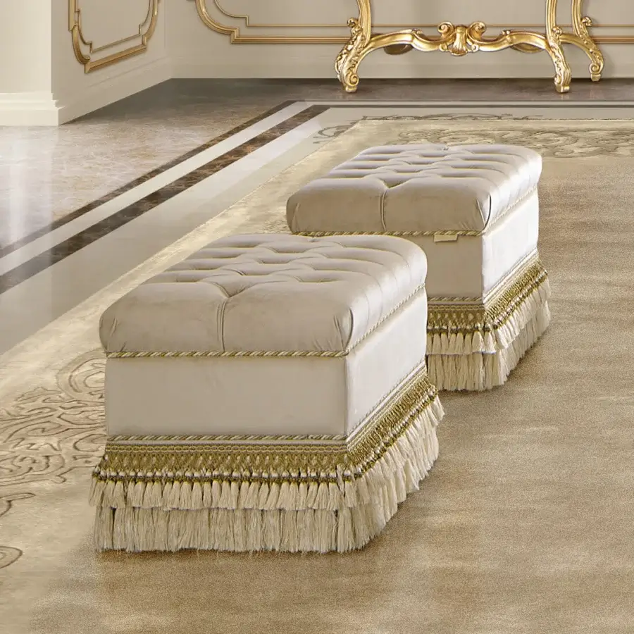 Lavish Modenese Royal Blend ottoman in white velvet with ornate gold banding and delicately scalloped fringe