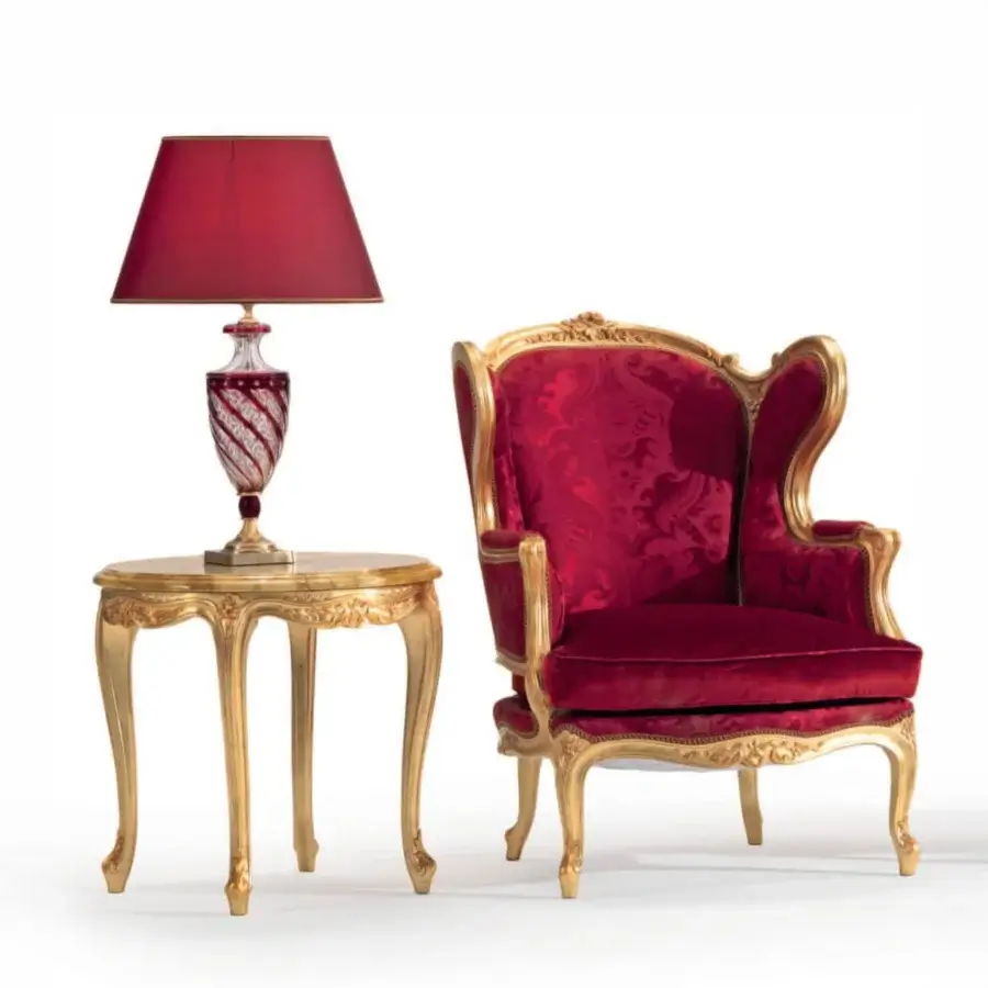 Distinguished Armando Rho A1375 side table crafted in Italy with gold leaf, red antique accents and a refined marble surface