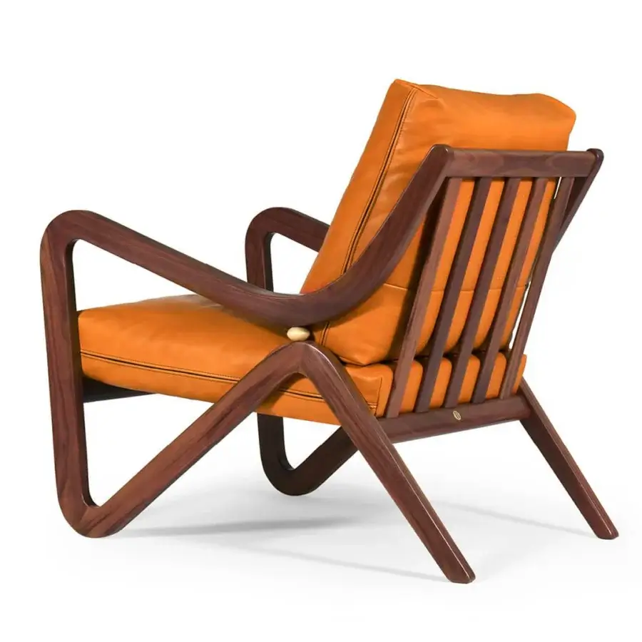 Refined Borzalino Taylor armchair with vibrant orange textile upholstery and lacquered canaletto walnut frame crafted in Italy
