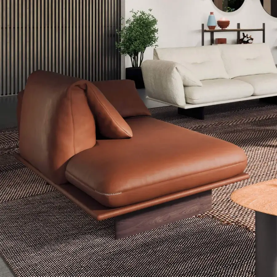 Exceptional Borzalino Connor chaise longue upholstered in reddish-brown leather with channeled quilting and a canaletto walnut base