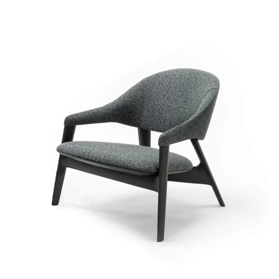 Distinguished Zanaboni Egle lounge chair upholstered in premium leather with a sculptural solid wood structure and matte finish