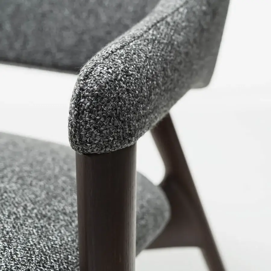 Exceptional Zanaboni Egle lounge chair crafted with sculpted solid wood and medium gray heathered textile upholstery in a satin finish