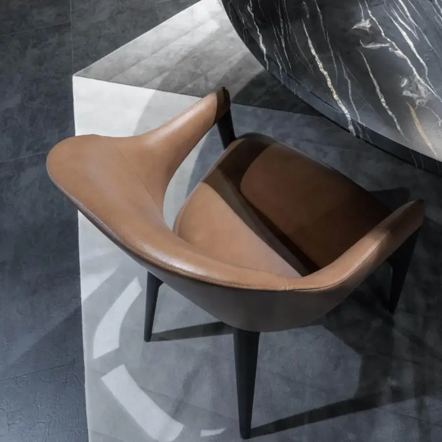 Distinguished Zanaboni Egle armchair crafted with sculptural solid wood and premium leather in a warm medium brown finish