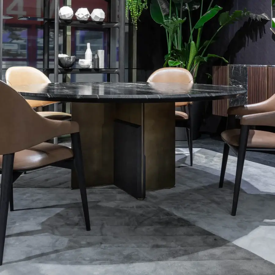 Exclusive Zanaboni Egle armchair with sculptural solid wood and premium leather upholstery in a warm medium brown tone