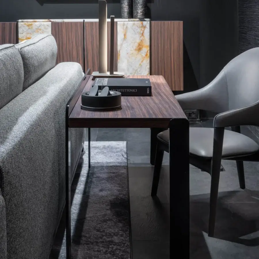 Elegant Zanaboni Egle armchair crafted with sculptural solid wood and premium medium-grey textured leather upholstery