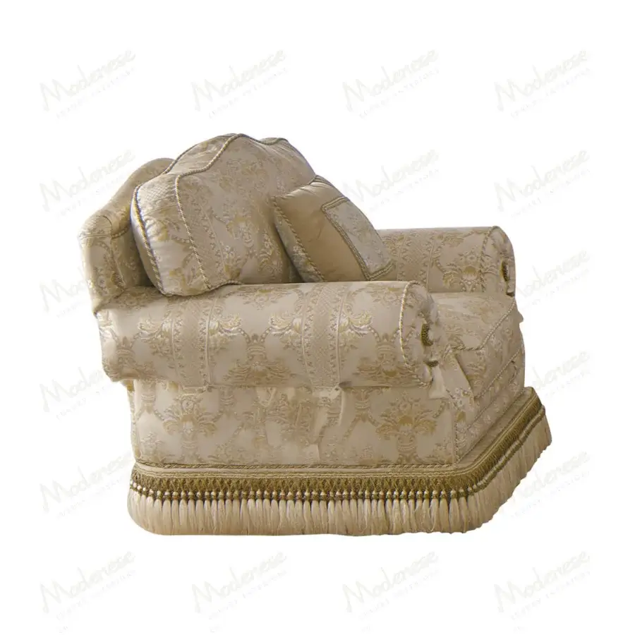 Exquisite Modenese Royal Blend lounge chair with gold and cream textile upholstery and red tassel fringe detailing