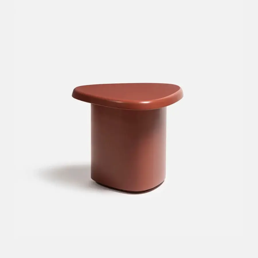 Superior Carpanese Home Bitt side table with terracotta tabletop and smooth matte synthetic material build