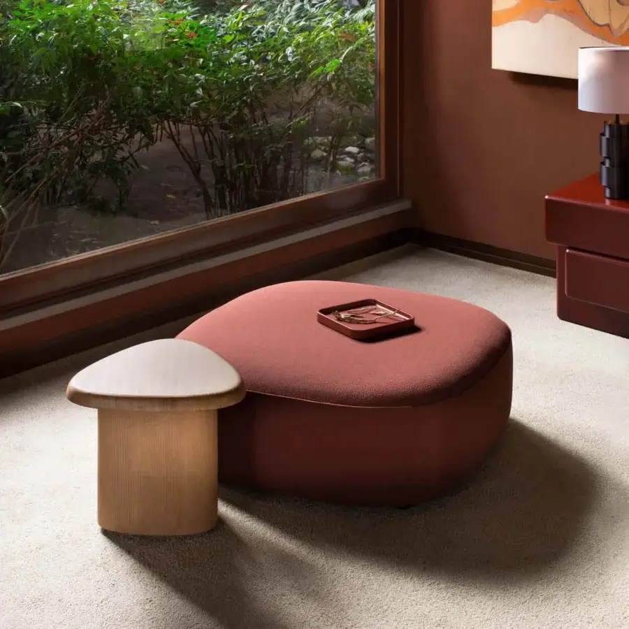 Exceptional Carpanese Home Bitt side table crafted from wood with a satin finish and visible grain