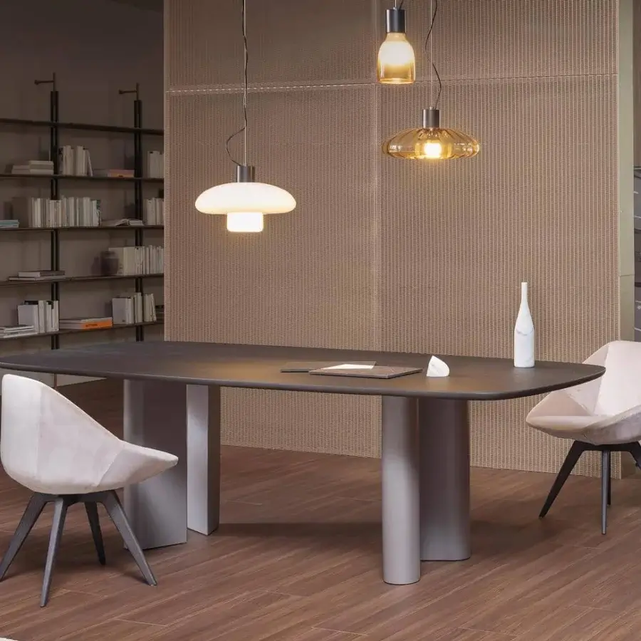 Innovative Bonaldo Geometric table with shaped top in dark matte finish and light gray painted aluminum base