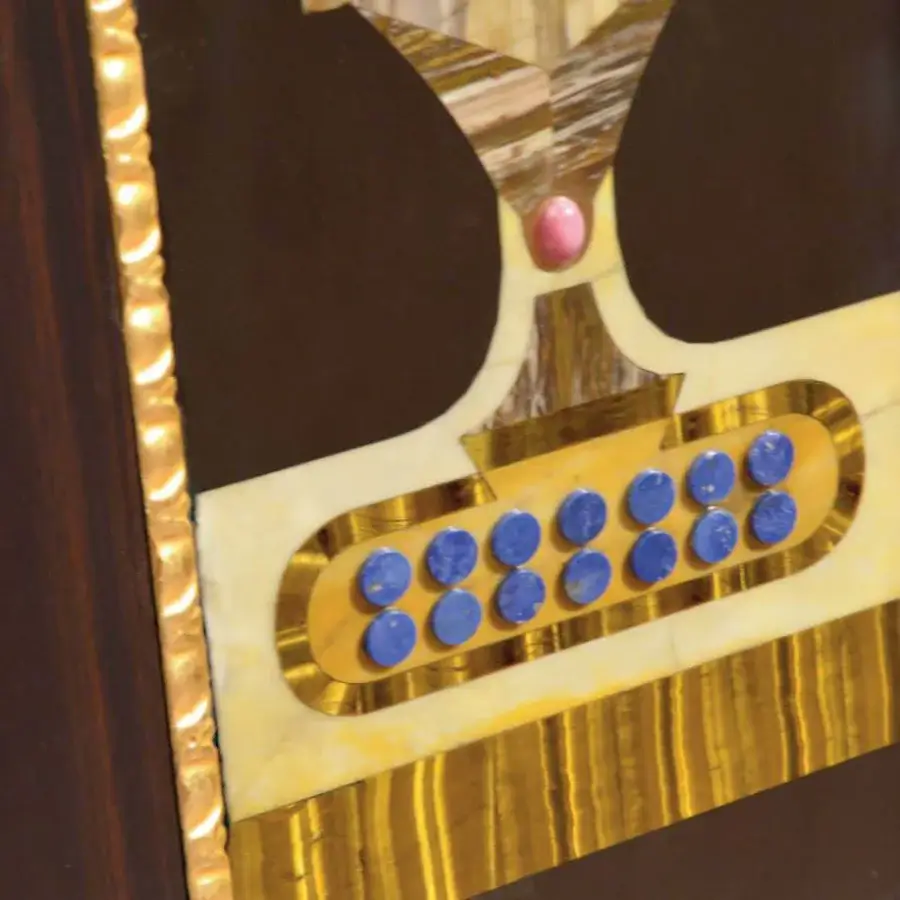 Distinguished Armando Rho A1399 cabinet crafted in deep ebony with brass inlays and precious stone detailing