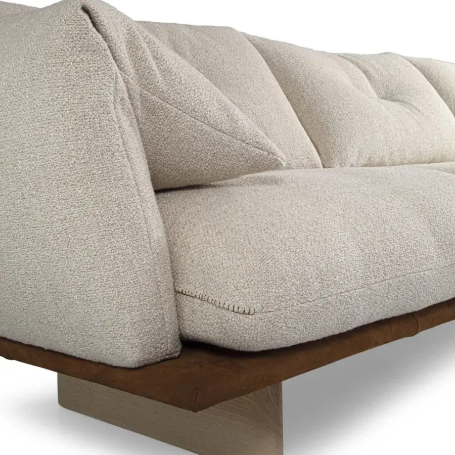 Superior Borzalino Connor sectional in textured off-white bouclé fabric with a satin-finish hardwood base