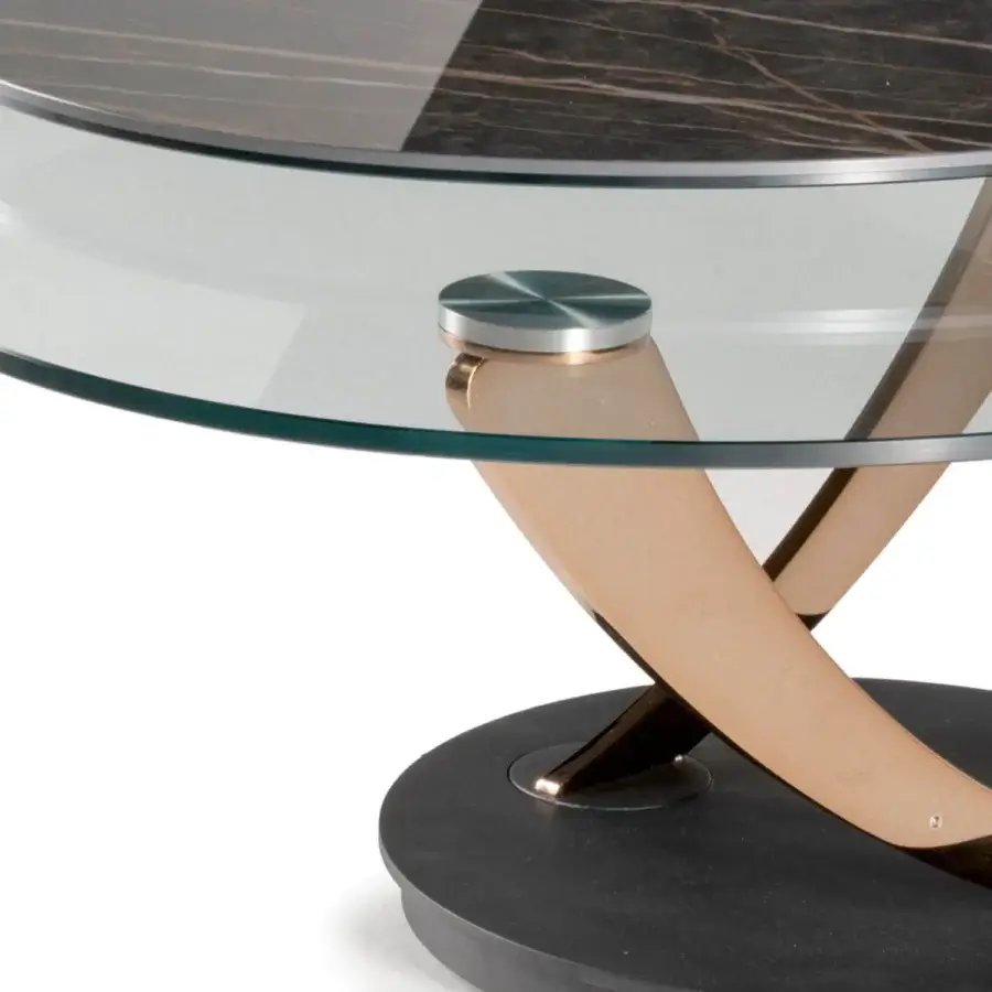 Distinguished Naos Balestra coffee table crafted in Italy with revolving clear glass tops and galvanically treated golden-toned metal base