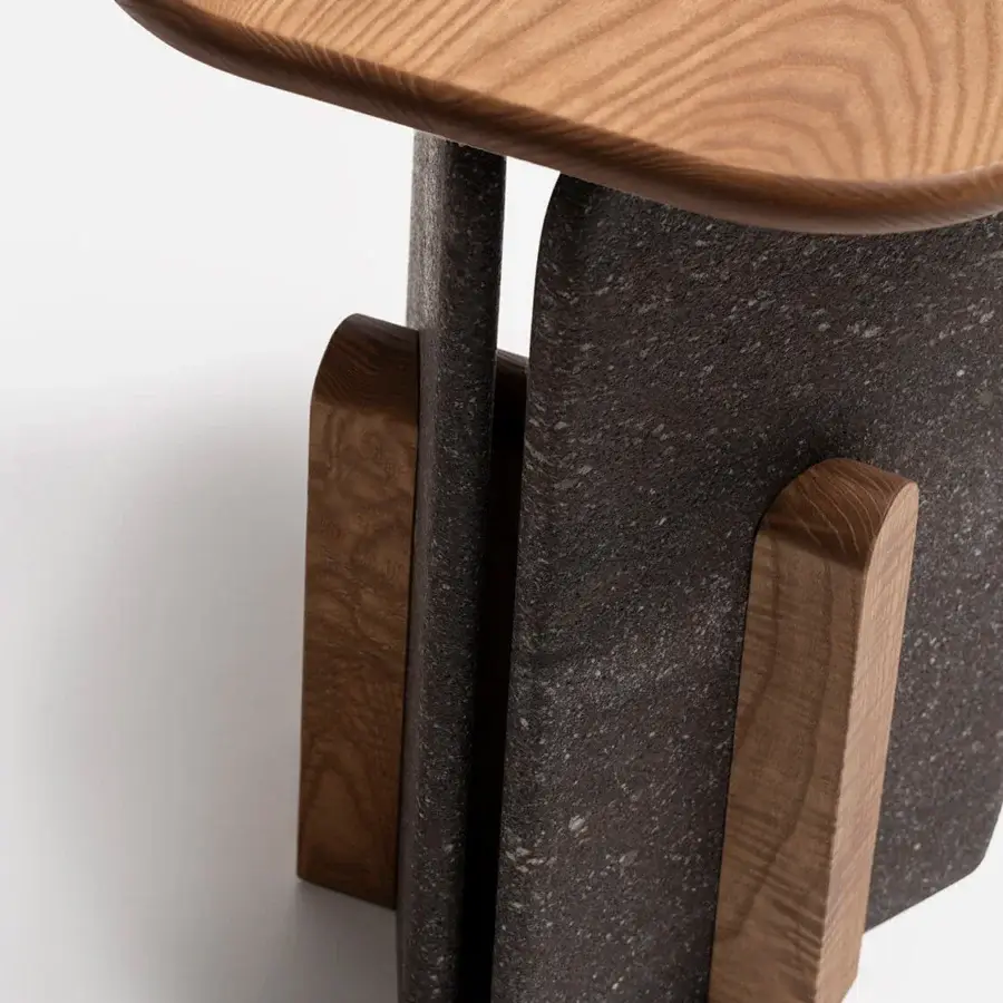 Exceptional Carpanese Home Slabs side table crafted in wood and dark granular material with satin and matte finishes