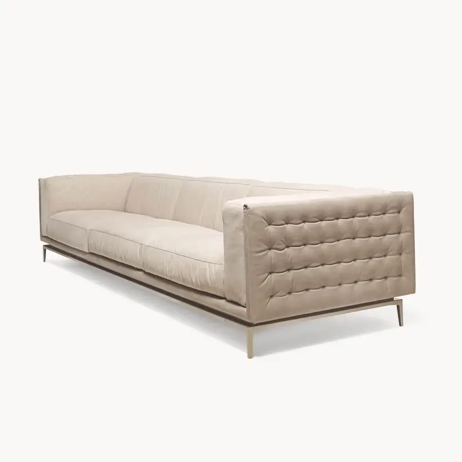 Exceptional Visionnaire Legend sofa with quilted beige leather upholstery and satinized stainless steel base